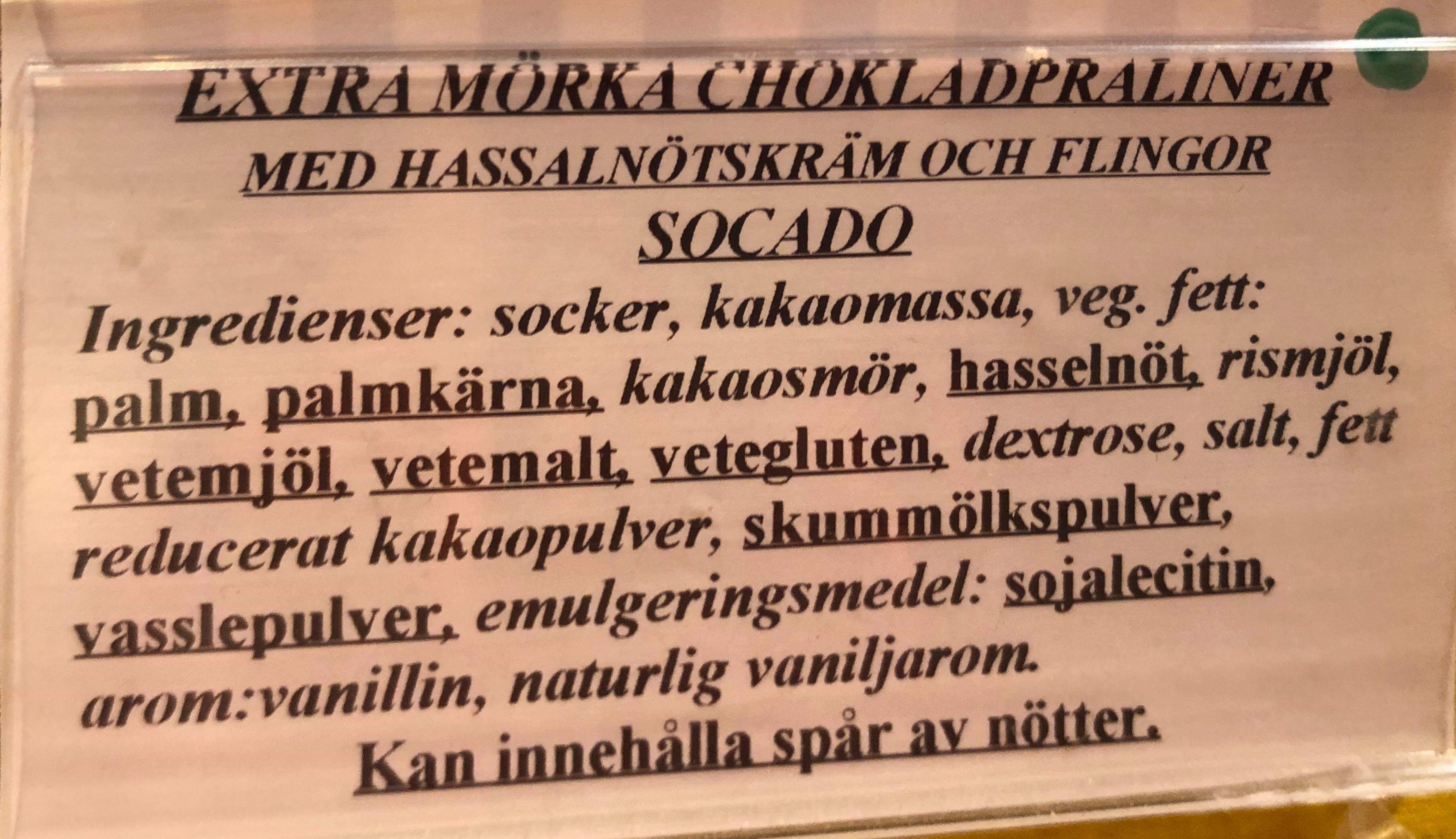 Extra mrka choklad praliner fylld med hasselntskrm och flingor